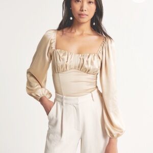 Gold satin long sleeve puff top